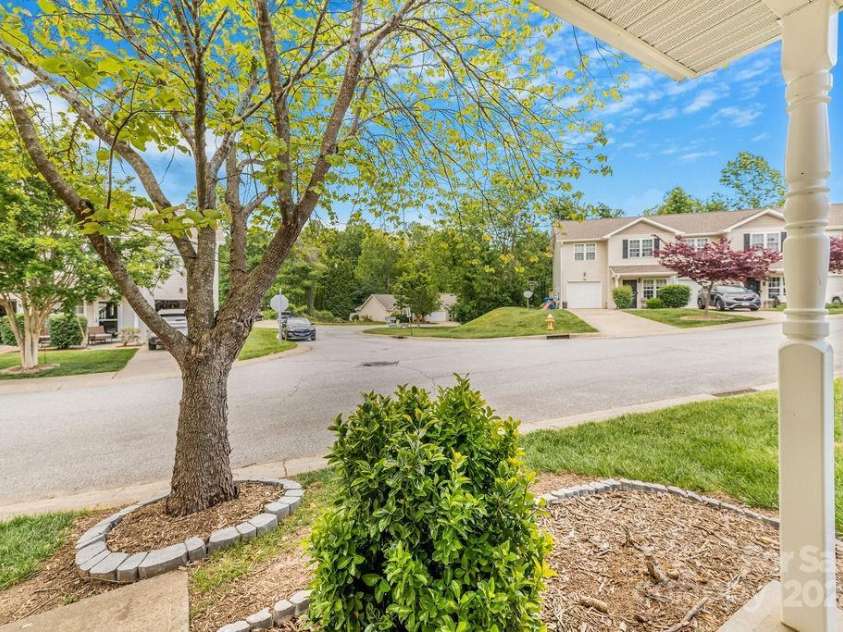 41 Lanceford Circle, Fletcher, NC 28732.  MLS# CAR4252559, YatesRealty ID 11531. Sit a spell on the covered front porch