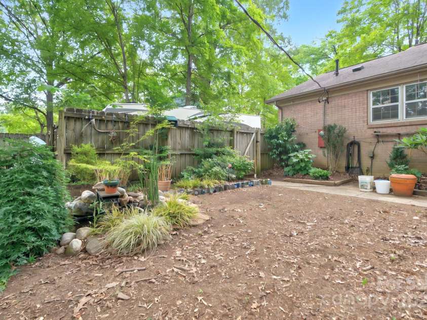 3430 Rea Road, Charlotte, NC 28226.  MLS# CAR4256646, YatesRealty ID 11536. Relax to the soothing sounds of a little pond