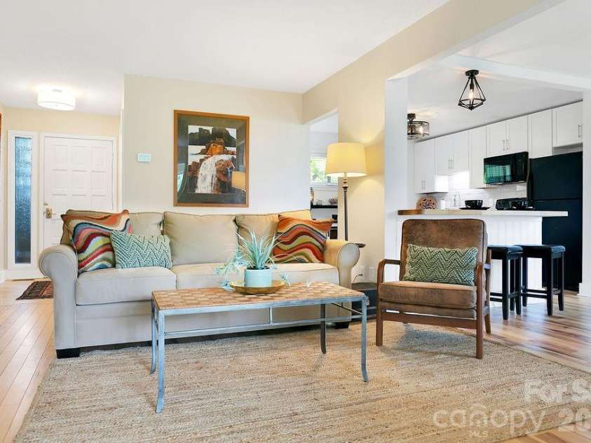 216 Tinequa Drive, Brevard, NC 28712.  MLS# CAR4365636, YatesRealty ID 11539. Cozy & inviting space