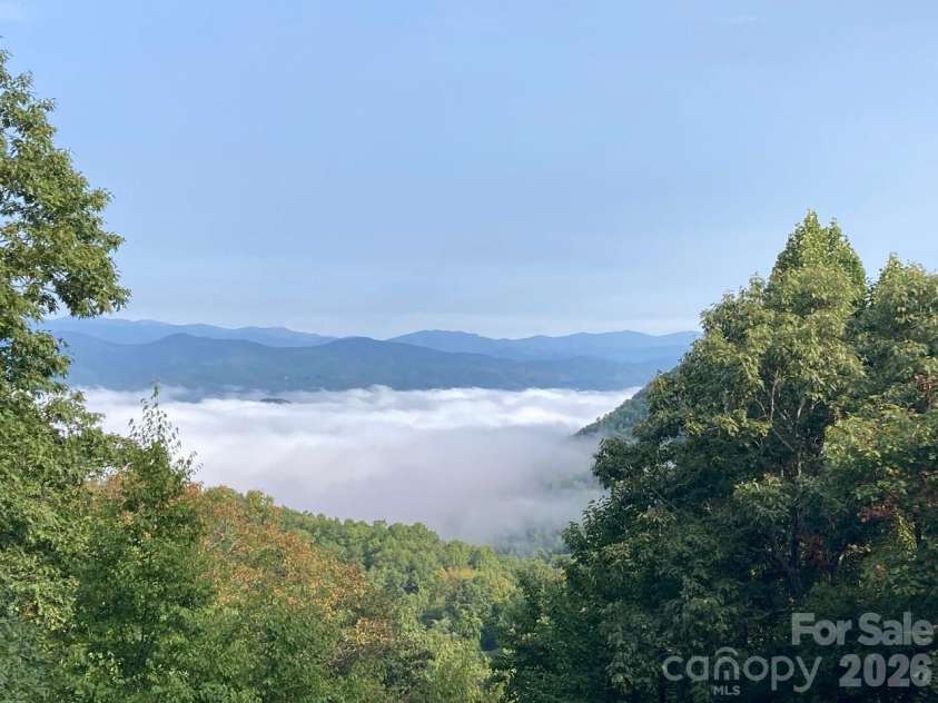 216 Tinequa Drive, Brevard, NC 28712.  MLS# CAR4365636, YatesRealty ID 11539. Ever-changing mountain views from the condo...