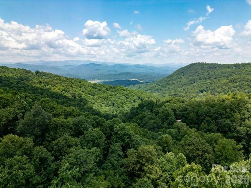 216 Tinequa Drive, Brevard, NC 28712.  MLS# CAR4365636, YatesRealty ID 11539. Mountains & sky...