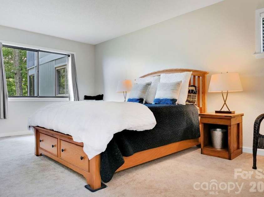 216 Tinequa Drive, Brevard, NC 28712.  MLS# CAR4365636, YatesRealty ID 11539. Reading nook in the corner has mountain views