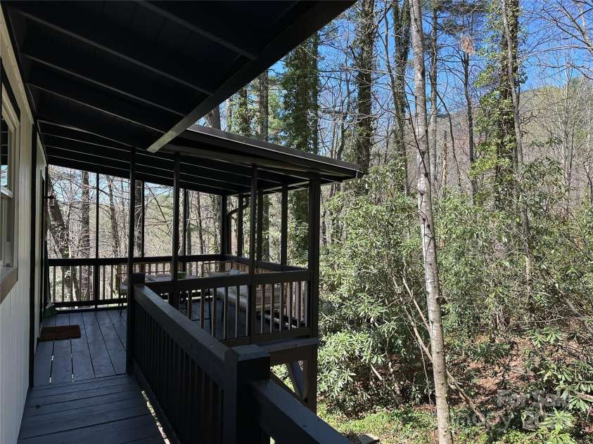 17 Village Way, Sapphire, NC 28774.  MLS# CAR4256593, YatesRealty ID 11545. Front Entry Walkway and porch