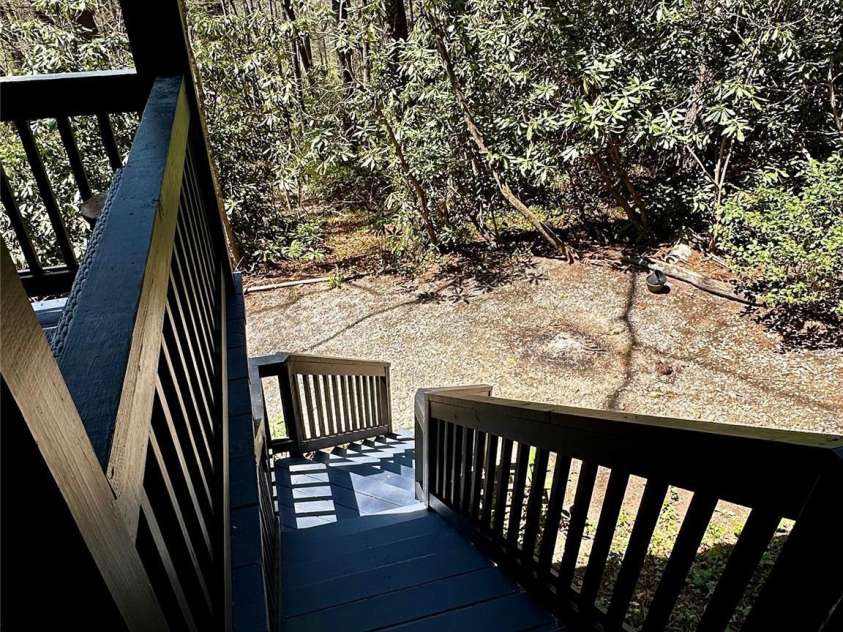 17 Village Way, Sapphire, NC 28774.  MLS# CAR4256593, YatesRealty ID 11545. Stairs to back parking