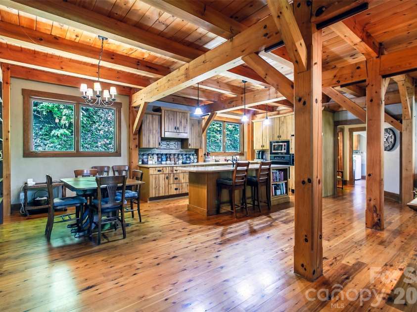 58 Great Aspen Way, Black Mountain, NC 28711.  MLS# CAR4366858, YatesRealty ID 11545. Plenty of space for a formal dining suite in this kitchen, which features hickory cabinets.