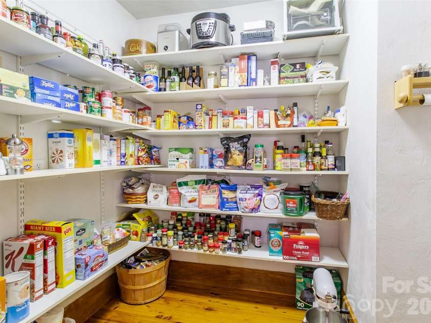 58 Great Aspen Way, Black Mountain, NC 28711.  MLS# CAR4366858, YatesRealty ID 11545. So much space in this walk-in pantry for food, small appliances, cookbooks, and more!