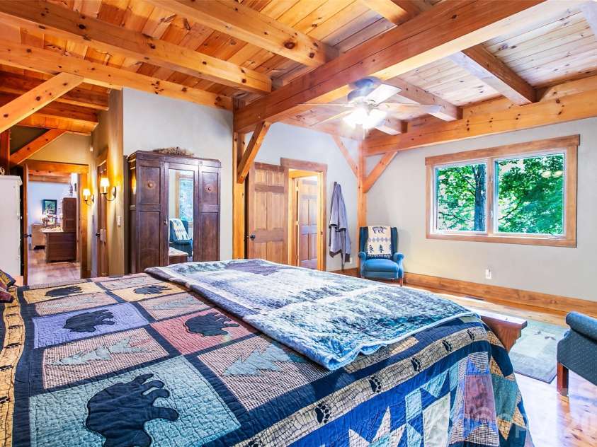58 Great Aspen Way, Black Mountain, NC 28711.  MLS# CAR4366858, YatesRealty ID 11545. There's plenty of room for furniture and a sitting area in the ensuite primary bedroom.