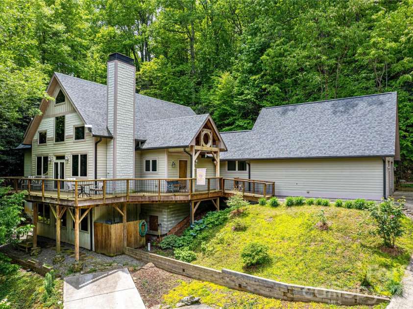 58 Great Aspen Way, Black Mountain, NC 28711.  MLS# CAR4366858, YatesRealty ID 11545. This lovingly cared for A-frame home is perfect for multigenerational living or a 2-way rental for the savvy investor.