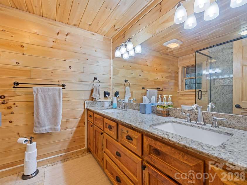 693 High Splendor Road, Robbinsville, NC 28771.  MLS# CAR4362499, YatesRealty ID 11558. Primary Suite Bath with Dual Vanity