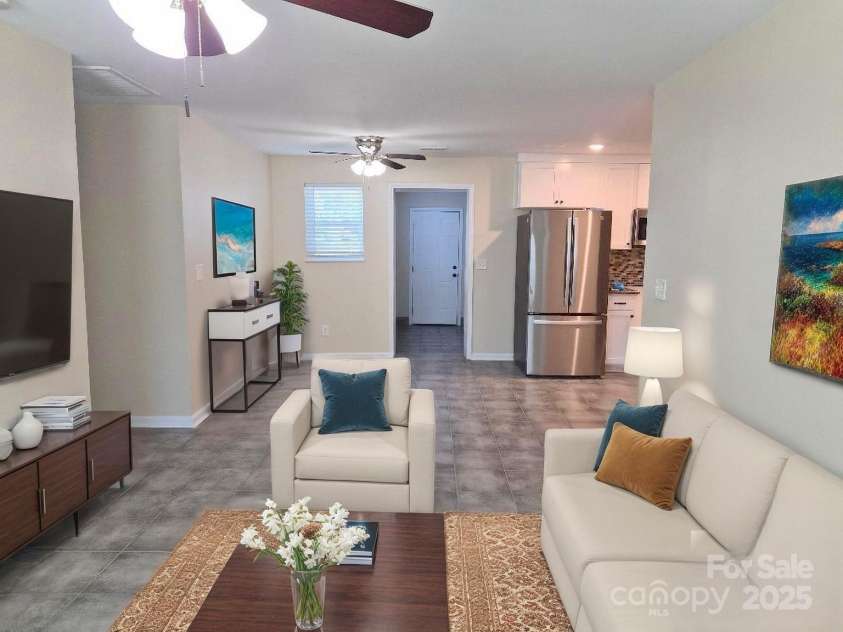 1352 Steed Street, Rock Hill, SC 29732.  MLS# CAR4315486, YatesRealty ID 1156. Virtually AI Staged Living Room/Dining Room