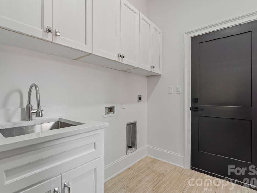8806 Hearthstone Court, Terrell, NC 28682.  MLS# CAR4402631, YatesRealty ID 11561. Laundry room