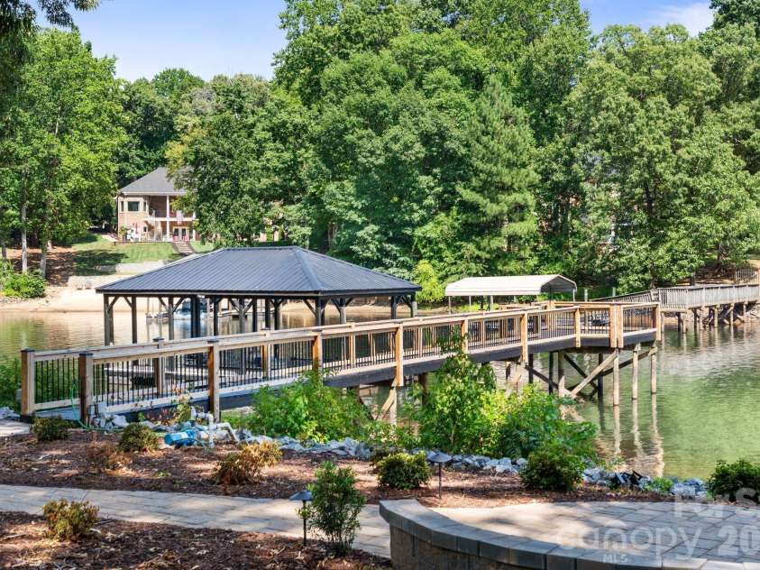 8806 Hearthstone Court, Terrell, NC 28682.  MLS# CAR4402631, YatesRealty ID 11561. Private boardwalk to covered dock