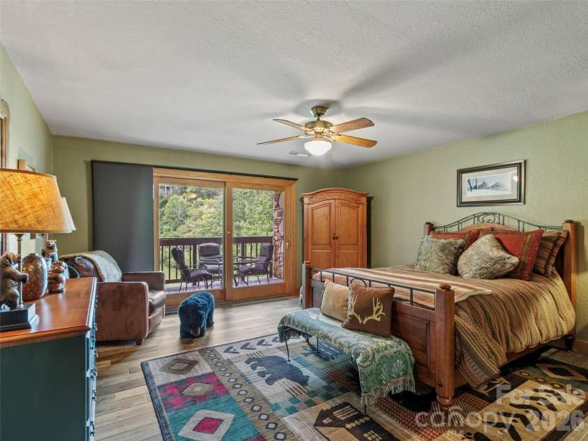 151 Austin Mountain Drive, Burnsville, NC 28714.  MLS# CAR4363639, YatesRealty ID 11563. Cozy guest suite with deck access & scenic view