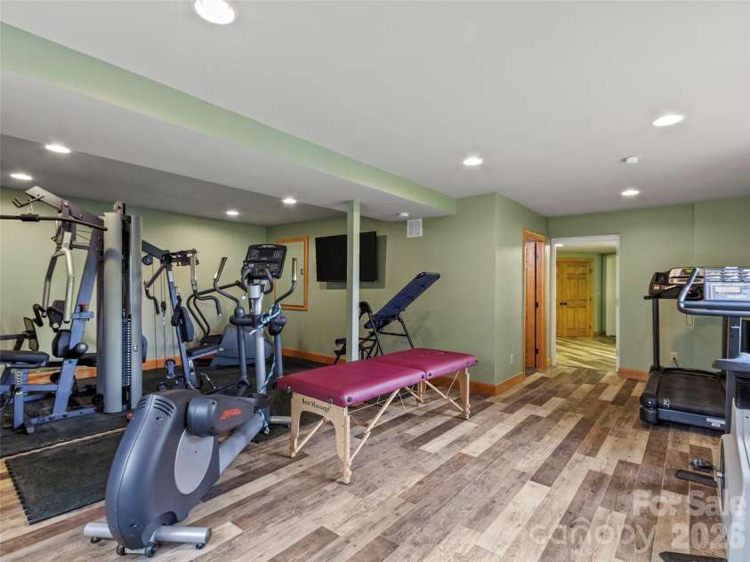 151 Austin Mountain Drive, Burnsville, NC 28714.  MLS# CAR4363639, YatesRealty ID 11563. Versatile wellness space - perfect for workouts, yoga, or a golf simulator