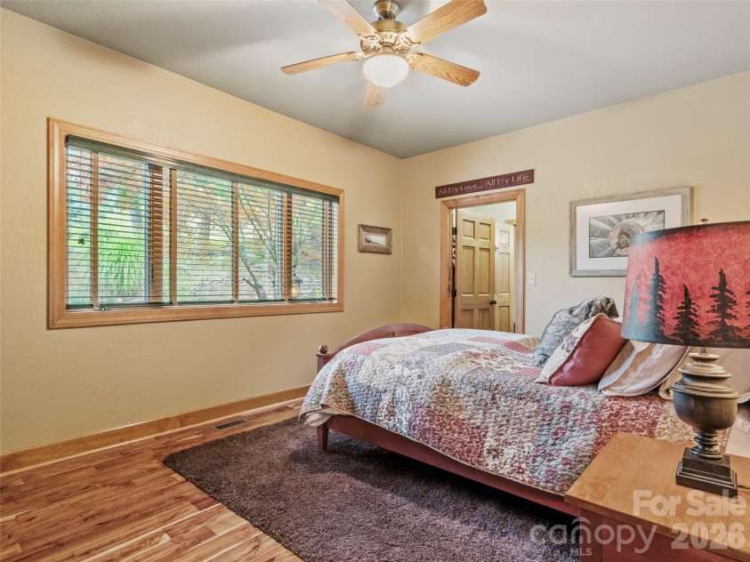 151 Austin Mountain Drive, Burnsville, NC 28714.  MLS# CAR4363639, YatesRealty ID 11563. Warm & inviting en-suite with natural light