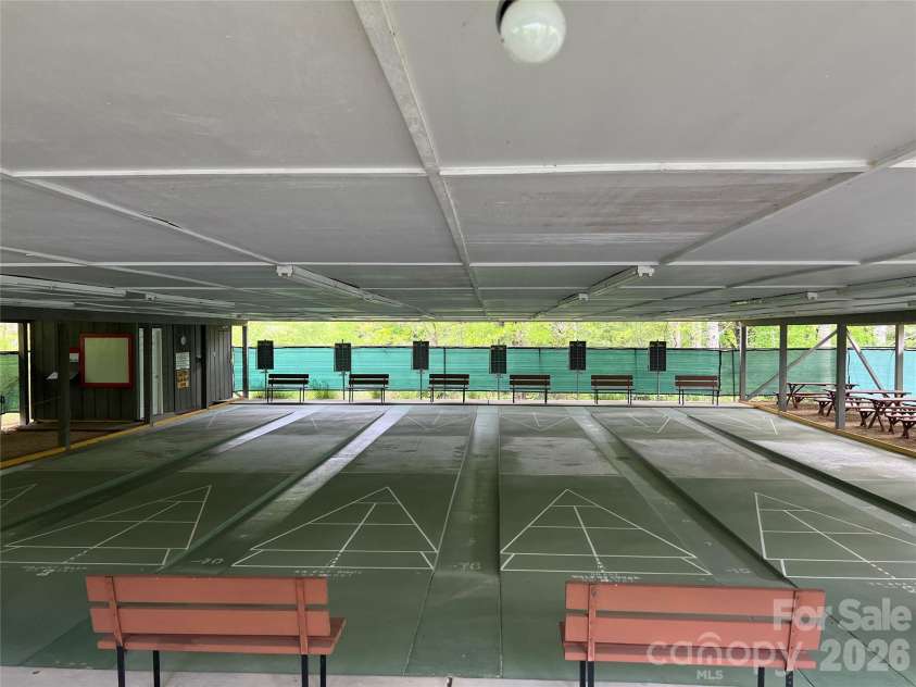 20 Lady Slipper Loop, Newland, NC 28657.  MLS# CAR4363646, YatesRealty ID 11564. Covered shuffleboard