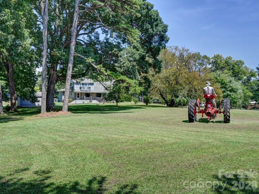 1771 Drexel Road, Valdese, NC 28690.  MLS# CAR4364186, YatesRealty ID 11568. Decorative Tractor