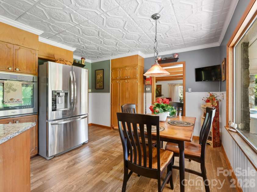 1771 Drexel Road, Valdese, NC 28690.  MLS# CAR4364186, YatesRealty ID 11568. Dining are in kitchen looking into front living room