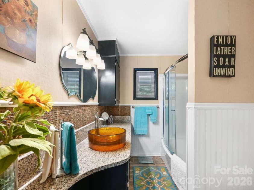 1771 Drexel Road, Valdese, NC 28690.  MLS# CAR4364186, YatesRealty ID 11568. Downstairs bathroom