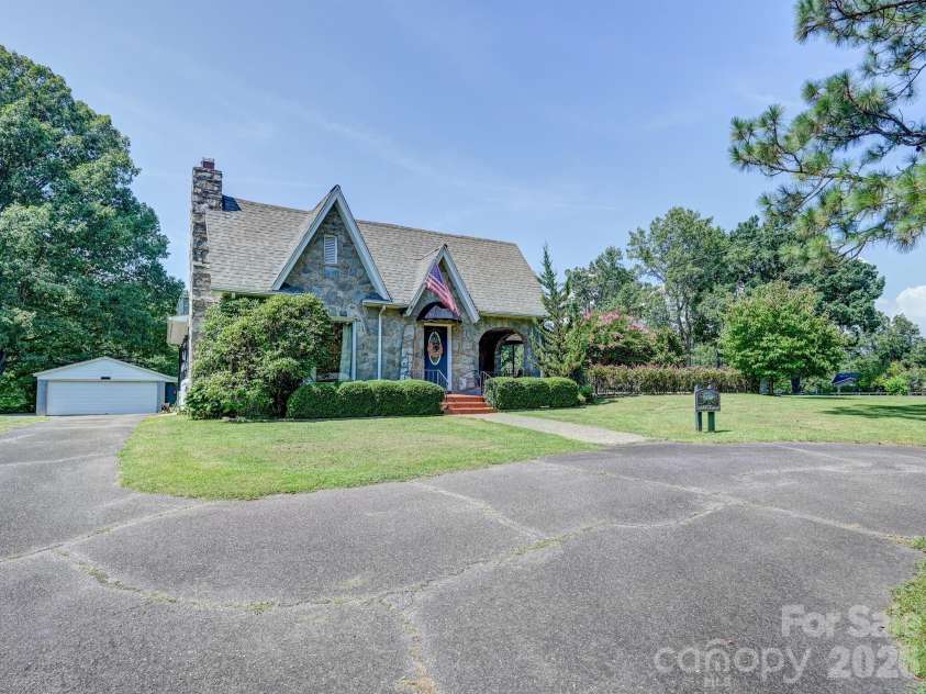 1771 Drexel Road, Valdese, NC 28690.  MLS# CAR4364186, YatesRealty ID 11568. Front view with garage