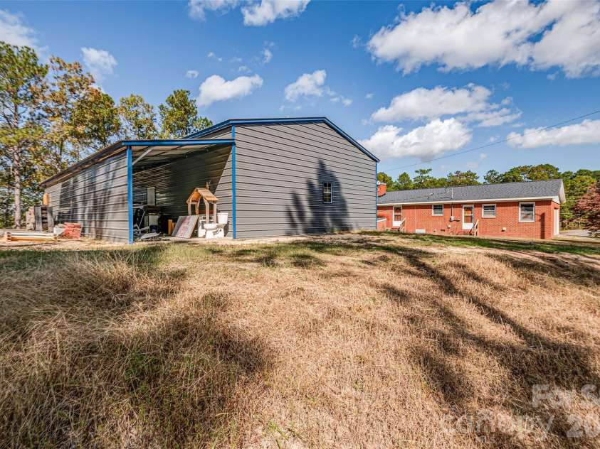 8684 Teals Mill Road, Cheraw, SC 29520.  MLS# CAR4195030, YatesRealty ID 11568. Shop has carport  in back