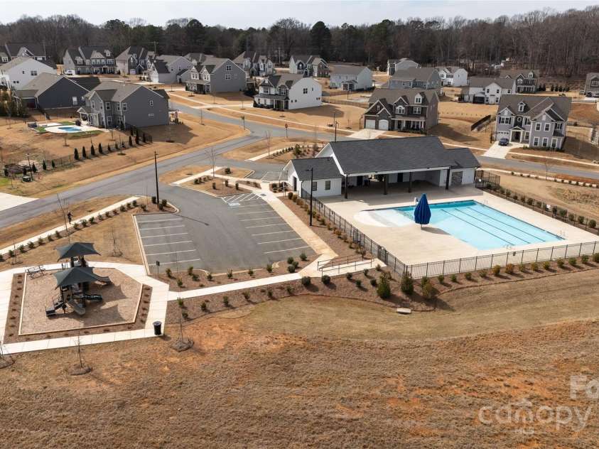 611 Yucatan Drive, Waxhaw, NC 28173.  MLS# CAR4224325, YatesRealty ID 11569. Aerial View Community Pool