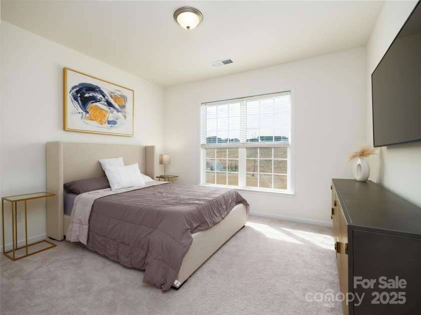 611 Yucatan Drive, Waxhaw, NC 28173.  MLS# CAR4224325, YatesRealty ID 11569. Main Level Bedroom