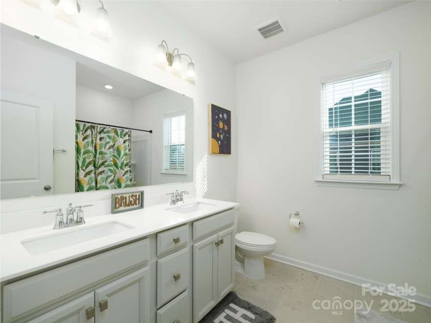 611 Yucatan Drive, Waxhaw, NC 28173.  MLS# CAR4224325, YatesRealty ID 11569. Secondary Bathroom