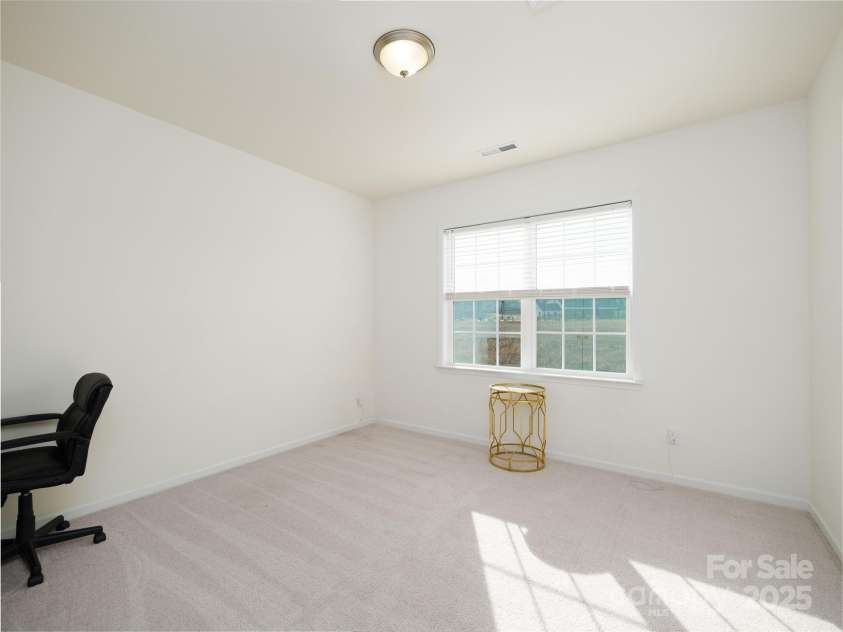 611 Yucatan Drive, Waxhaw, NC 28173.  MLS# CAR4224325, YatesRealty ID 11569. Secondary Bedroom 2