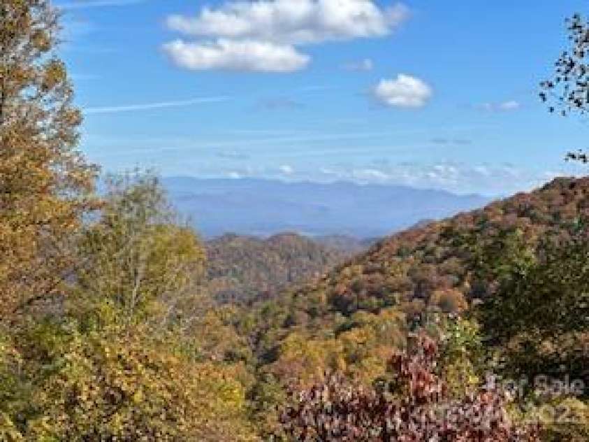 580 Freemont Drive, Leicester, NC 28748.  MLS# CAR4057787, YatesRealty ID 1157. Million Dollar Views!