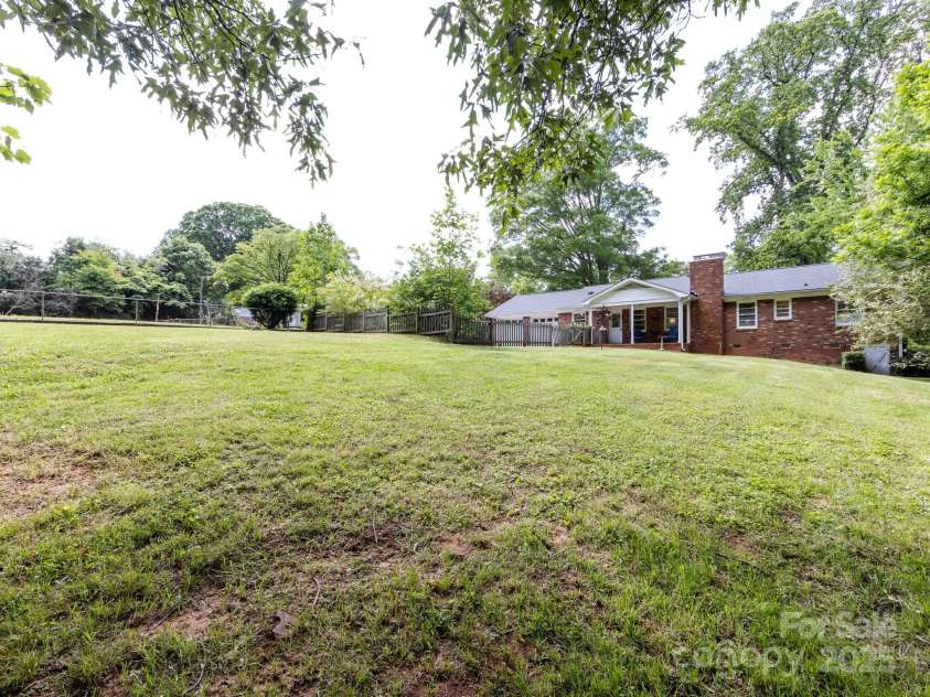 6616 Williams Road, Charlotte, NC 28215.  MLS# CAR4249256, YatesRealty ID 11574. Rear view of the house