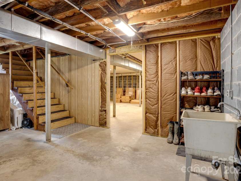 95 Hunters Ridge Road, Mills River, NC 28759.  MLS# CAR4244333, YatesRealty ID 11576. Basement doorway into partially finished area