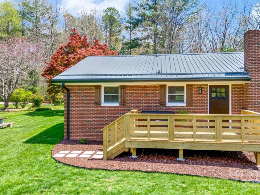 95 Hunters Ridge Road, Mills River, NC 28759.  MLS# CAR4244333, YatesRealty ID 11576. New back porch