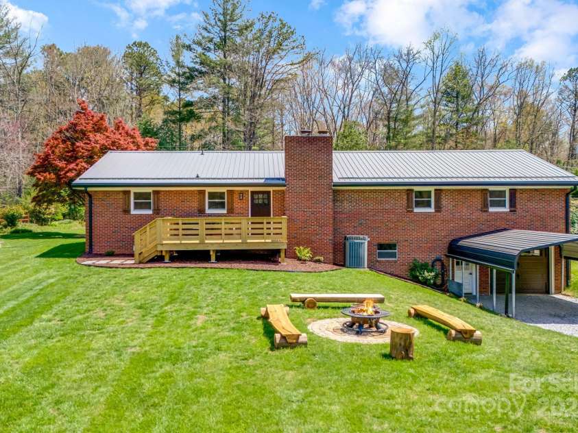 95 Hunters Ridge Road, Mills River, NC 28759.  MLS# CAR4244333, YatesRealty ID 11576. Rear of home