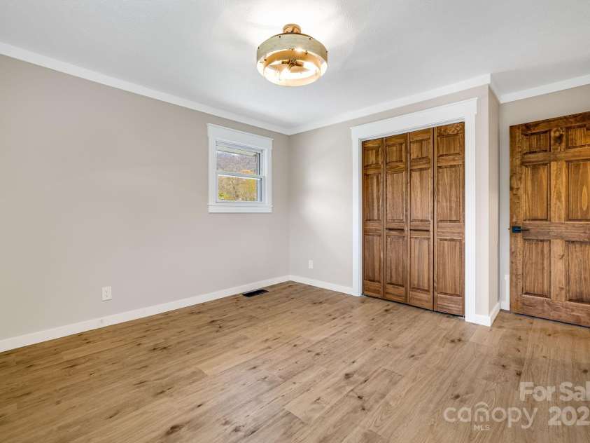 95 Hunters Ridge Road, Mills River, NC 28759.  MLS# CAR4244333, YatesRealty ID 11576. Second bedroom