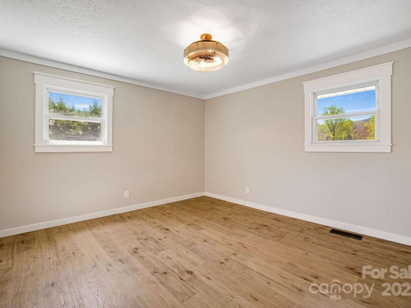 95 Hunters Ridge Road, Mills River, NC 28759.  MLS# CAR4244333, YatesRealty ID 11576. Second bedroom