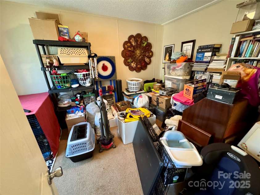 2084 Bristol Creek Avenue, Morganton, NC 28655.  MLS# CAR4247733, YatesRealty ID 11577. Bonus/office room currently used to pack to move