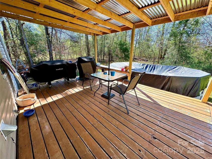 2084 Bristol Creek Avenue, Morganton, NC 28655.  MLS# CAR4247733, YatesRealty ID 11577. Grill by the pool