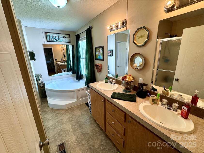 2084 Bristol Creek Avenue, Morganton, NC 28655.  MLS# CAR4247733, YatesRealty ID 11577. Primary bath w/double sinks
