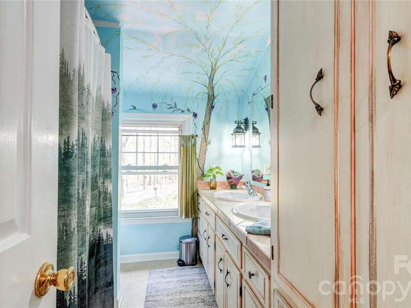 1035 Brafford Drive, Concord, NC 28025.  MLS# CAR4364837, YatesRealty ID 11578. Upstairs bath