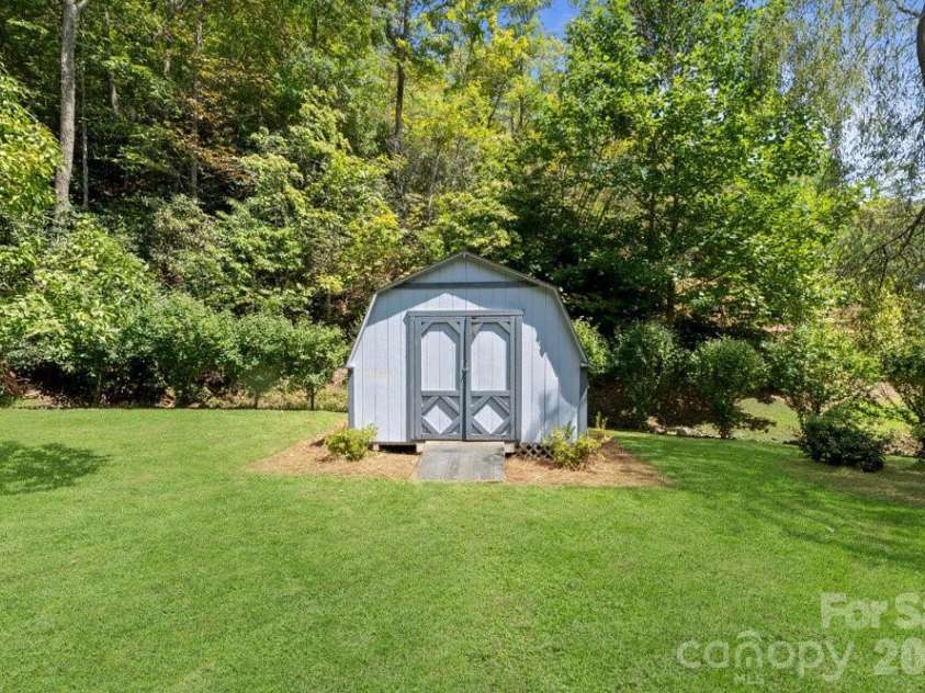 17 Twisted Trail, Black Mountain, NC 28711.  MLS# CAR4364900, YatesRealty ID 11581. Yard storage for lawn or games.