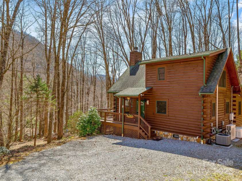 71 Honeymoon Lane, Maggie Valley, NC 28751.  MLS# CAR4240026, YatesRealty ID 11581. Ample parking with mountain views in the distance