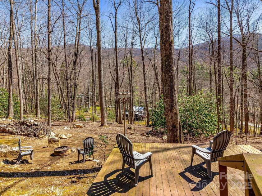 71 Honeymoon Lane, Maggie Valley, NC 28751.  MLS# CAR4240026, YatesRealty ID 11581. Fire pit area and additional deck