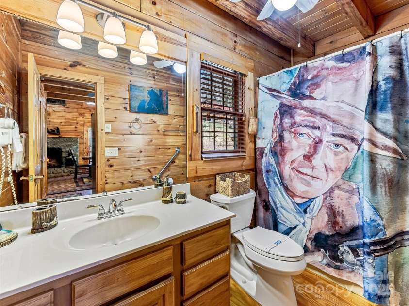 71 Honeymoon Lane, Maggie Valley, NC 28751.  MLS# CAR4240026, YatesRealty ID 11581. Full bathroom on main floor