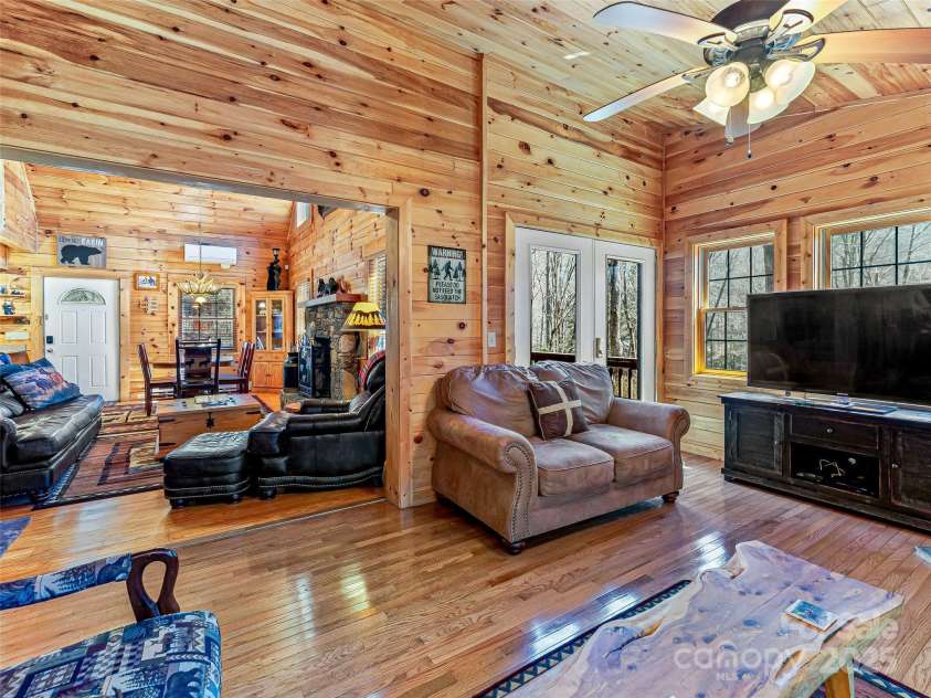 71 Honeymoon Lane, Maggie Valley, NC 28751.  MLS# CAR4240026, YatesRealty ID 11581. In addition to the living room, there is more space to relax in the well lit den area.