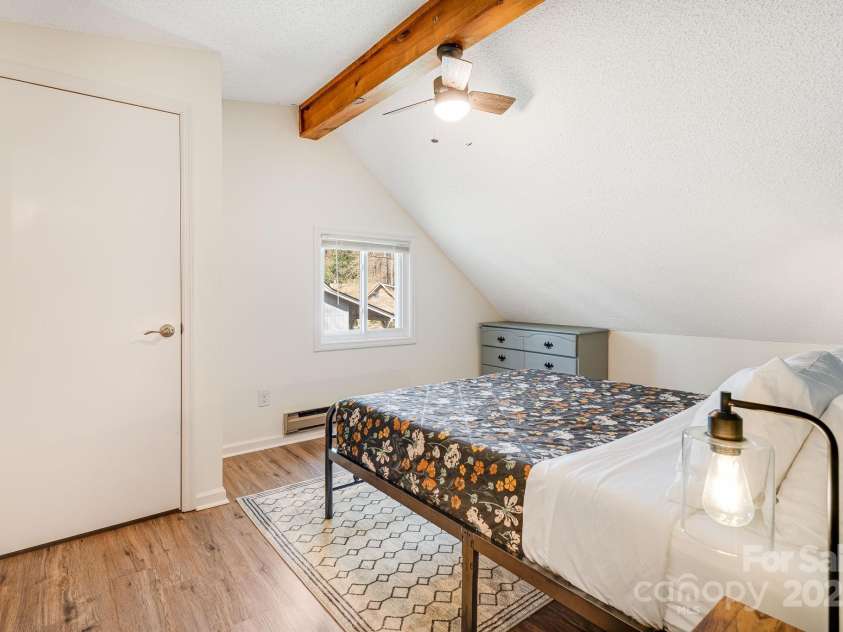 21 Susan Drive, Maggie Valley, NC 28751.  MLS# CAR4241989, YatesRealty ID 11582. Bedroom # 3 Upstairs with attached bathroom