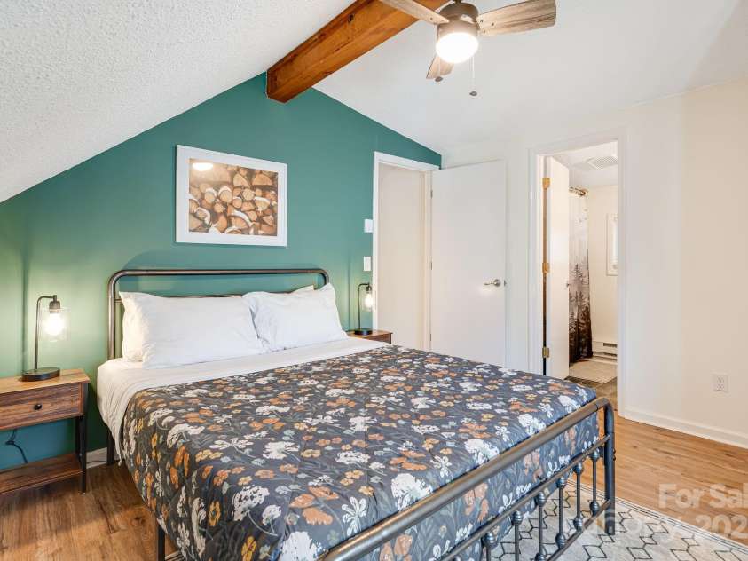 21 Susan Drive, Maggie Valley, NC 28751.  MLS# CAR4241989, YatesRealty ID 11582. Bedroom # 3 Upstairs with attached bathroom