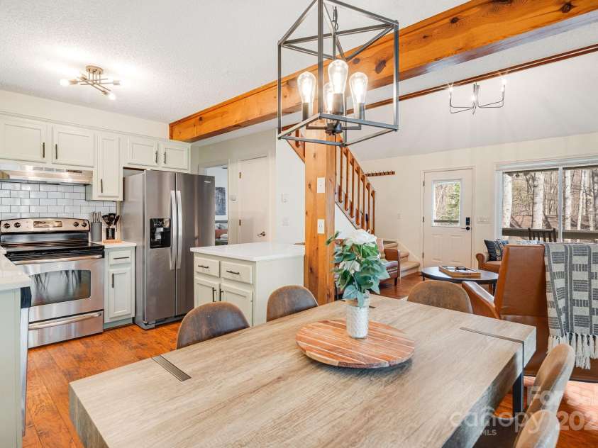 21 Susan Drive, Maggie Valley, NC 28751.  MLS# CAR4241989, YatesRealty ID 11582. Dining Space, open to kitchen and great room