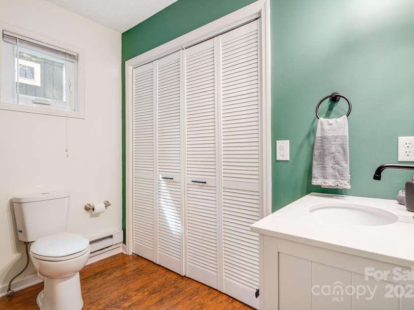 21 Susan Drive, Maggie Valley, NC 28751.  MLS# CAR4241989, YatesRealty ID 11582. Primary Bathroom downstairs