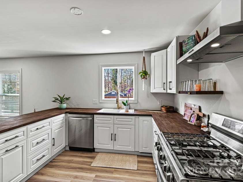 3995 Burton Lane, Denver, NC 28037.  MLS# CAR4219369, YatesRealty ID 11586. All new stainless appliances and gas top stove